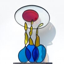 "Water en vuur", ca 60 cm mondgeblazen glas, smeedwerk kunstenaar: Jan Leenknegt Galerie Delfi Form